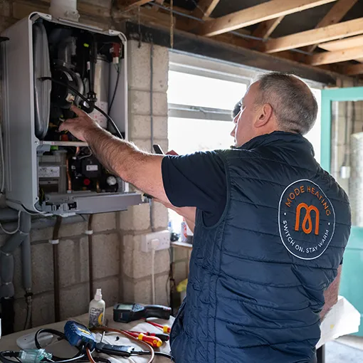 What is included in a central heating installation by Mode Heating