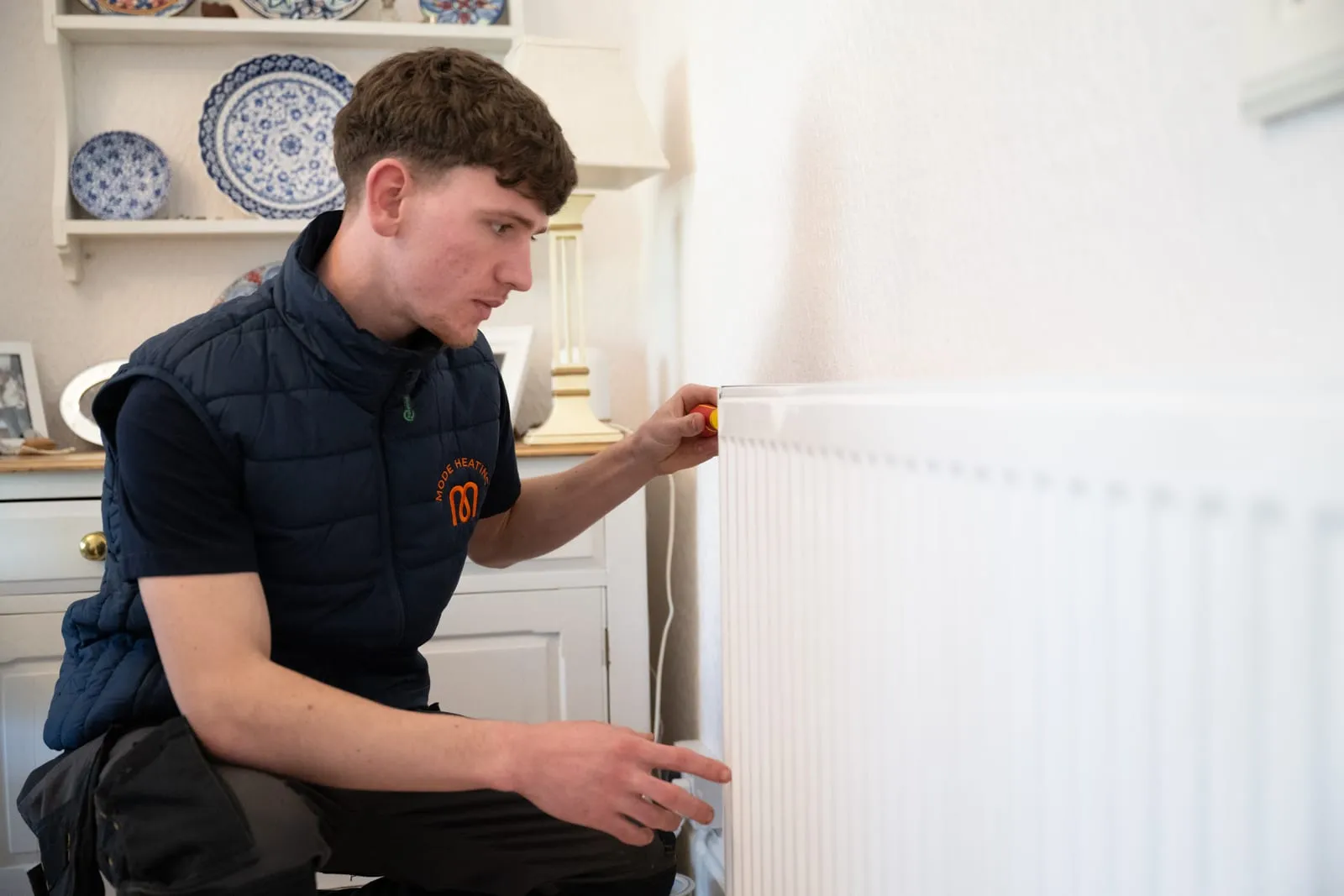 What is included in a power flushing service by Mode Heating